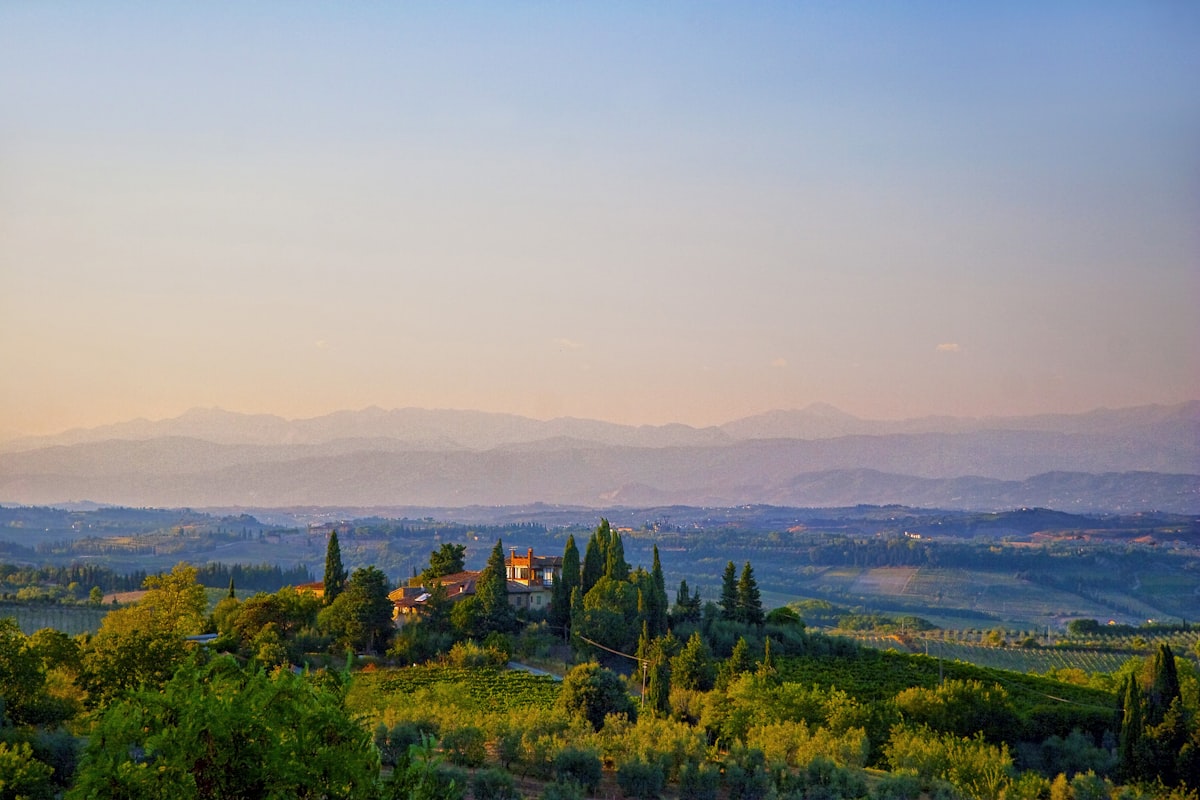 Stone villa surrounded by cypress trees in Tuscany